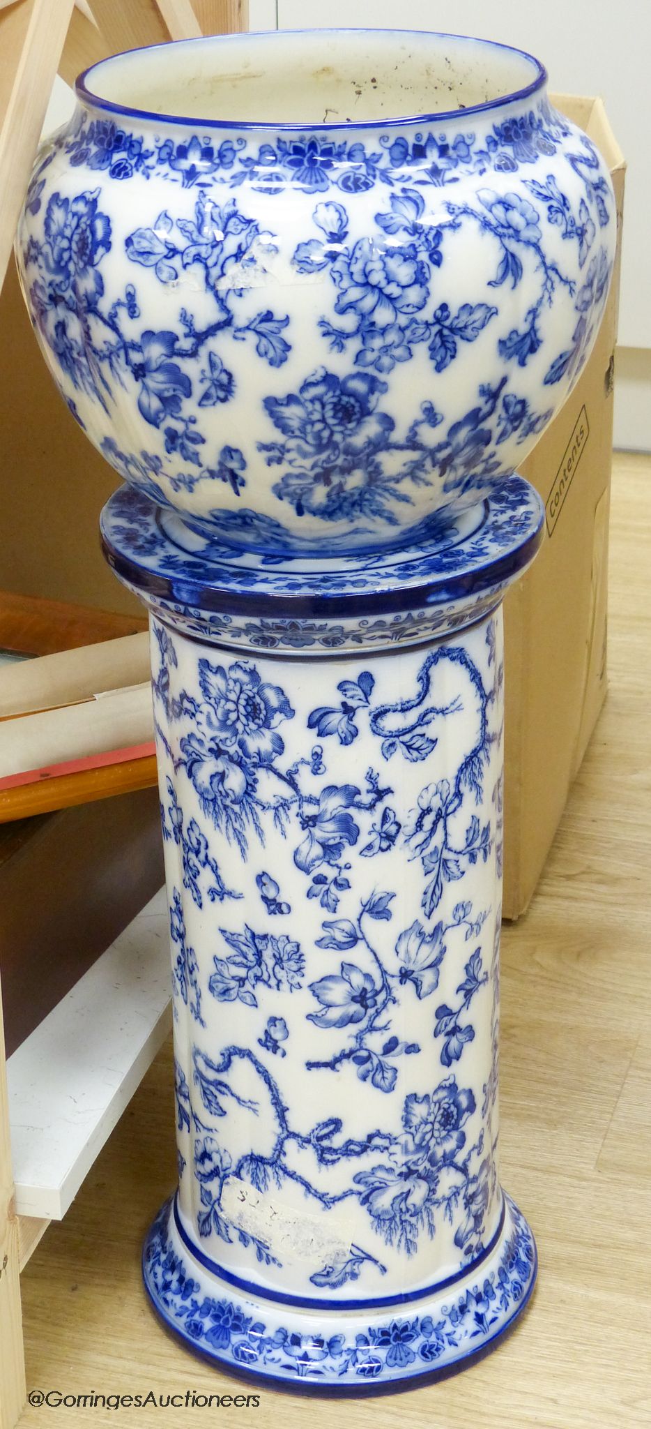 A Wedgwood Etruria England Swallow blue and white jardiniere and stand, height 79cm
